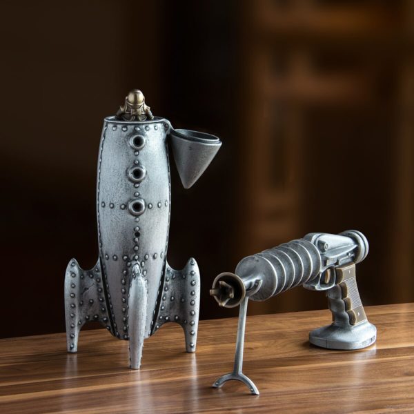 SCOTT NELLES Moon Rocket Coin Bank with Spaceman 
