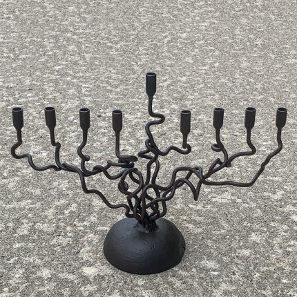 wrought iron menorah with curled design