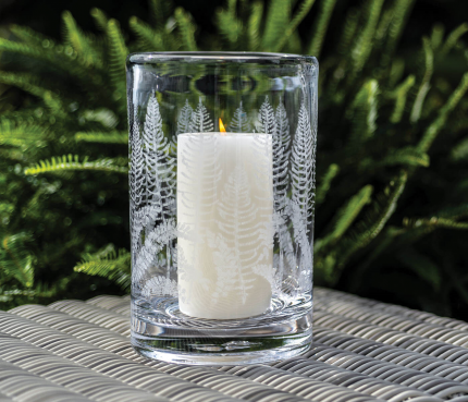 Engraved Fern Hurricane with lit candle